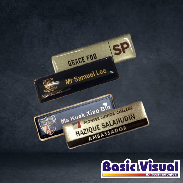 reusable-corporate-name-badges-tags-gold-silver-65-mm-x-35-mm-1-2-colour-silkscreen-print